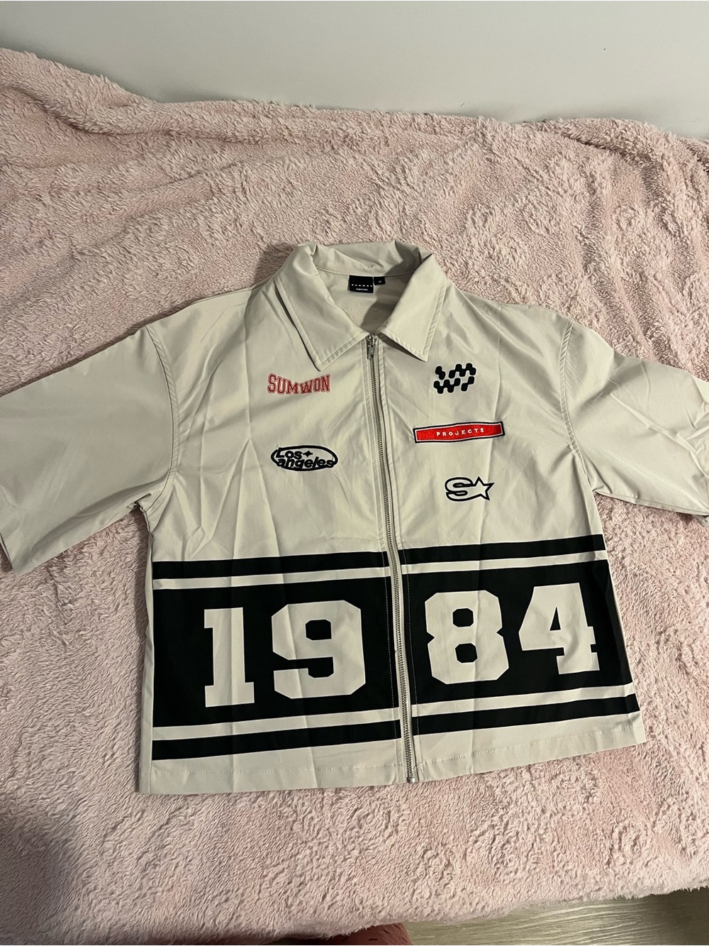Short Sleeve Zip-Front Shirt Jacket in Light Beige with Black 1984 Graphic